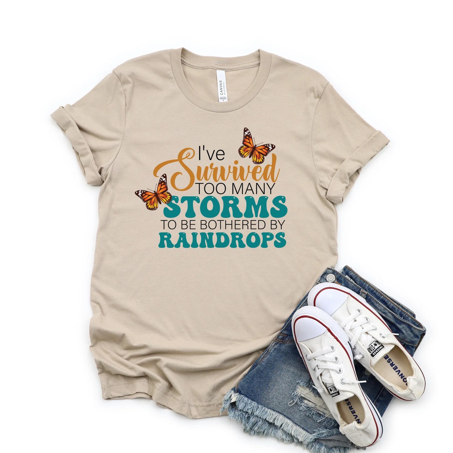 I’ve Survived Too Many Storms To Be Bothered By Raindrops Graphic Tee - 3 colors